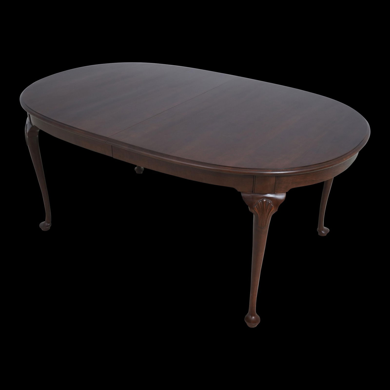 Stickley Cherry Queen Anne Dining Table 45x68.5 with 2 Leaves: Stickley Cherry Queen Anne Dining Table 45x68.5 with 2 Leaves This Stickley Cherry Queen Anne Dining Room Table is a timeless piece, showcasing high-quality solid cherry construction and a traditional