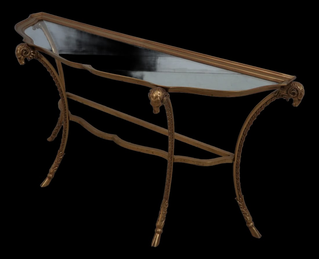 Labarge Rams Head Console Table Brass & Glass 63 x 19 x 32: Labarge Rams Head Console Table Brass & Glass 63 x 19 x 32 This stunning Rams Head Console Table features a solid brass frame with a beautifully scalloped glass top. Crafted with fine carved details a