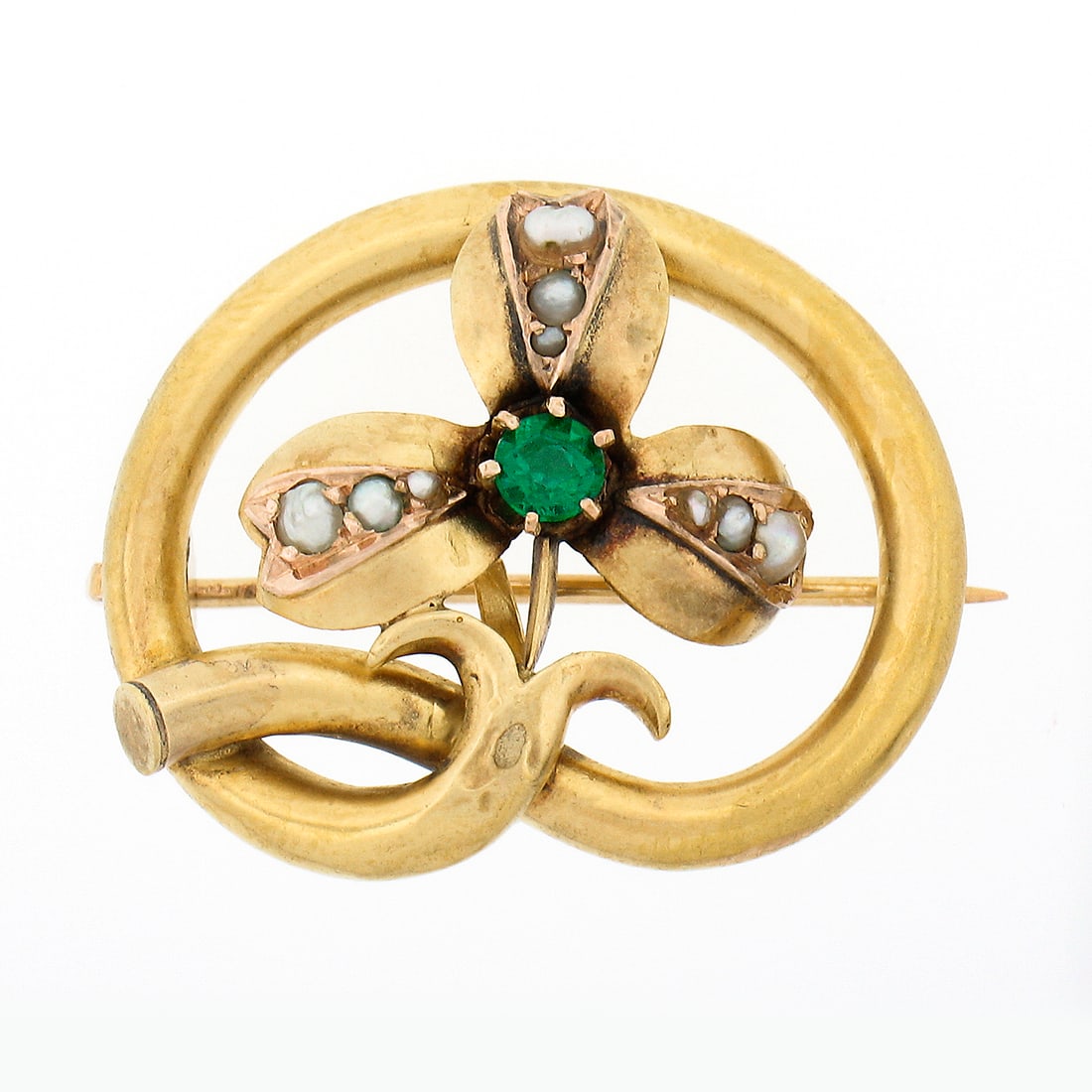 Antique Victorian 18+k Gold Clover Leaf Brooch with Emerald and Seed Pearls: Antique Victorian 18+k Gold Clover Leaf Brooch with Emerald and Seed Pearls This exquisite Antique Victorian brooch pin showcases a charming clover leaf design, elegantly crafted in solid 18+k yellow 