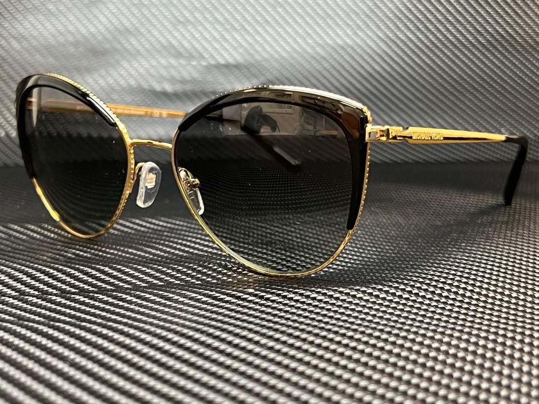 Michael Kors MK1046 Light Gold Cat Eye Women's Sunglasses 56mm: Michael Kors MK1046 Light Gold Cat Eye Women's Sunglasses 56mm Elevate your style with these MICHAEL KORS MK1046 sunglasses, featuring a chic cat-eye design. The frames are adorned in a luxurious ligh