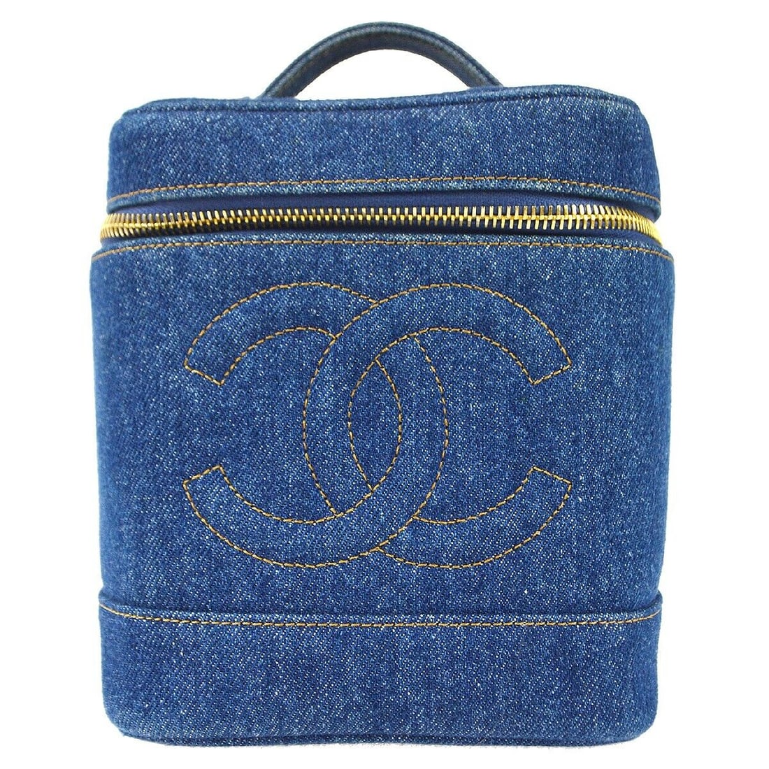 Chanel Vintage Indigo Denim Vanity Handbag 6x7x5 inches: Chanel Vintage Indigo Denim Vanity Handbag 6x7x5 inches This Chanel Vanity Handbag in indigo denim is a vintage piece that combines practicality with style. The bag features a classic blue exterior ma