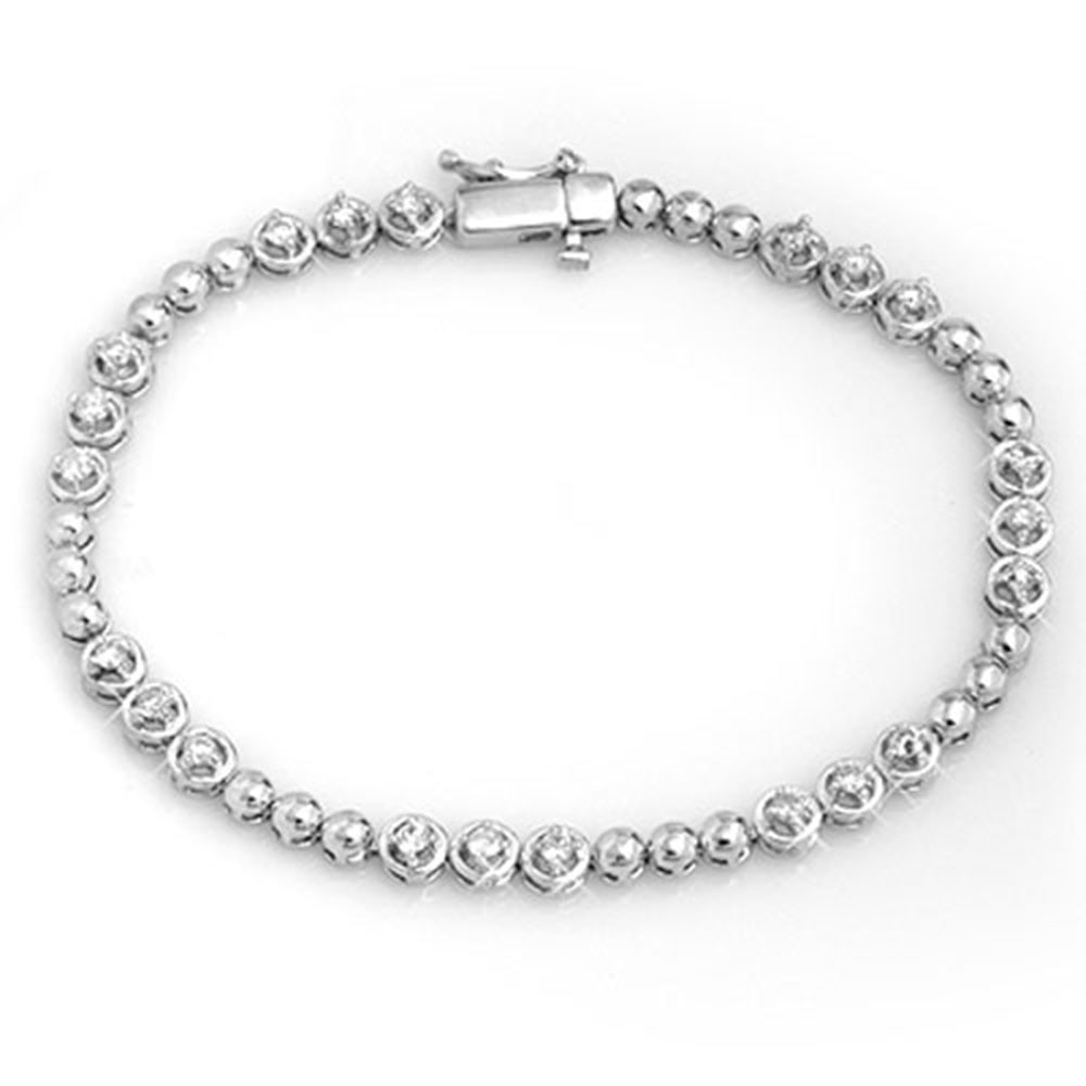 1.25 Carat VS/SI Diamond Bracelet in 10k White Gold 7 Inches: 1.25 Carat VS/SI Diamond Bracelet in 10k White Gold 7 Inches This exquisite diamond bracelet showcases a total gem weight of 1.25 carats, featuring 21 round-cut diamonds of VS/SI quality in a stunning
