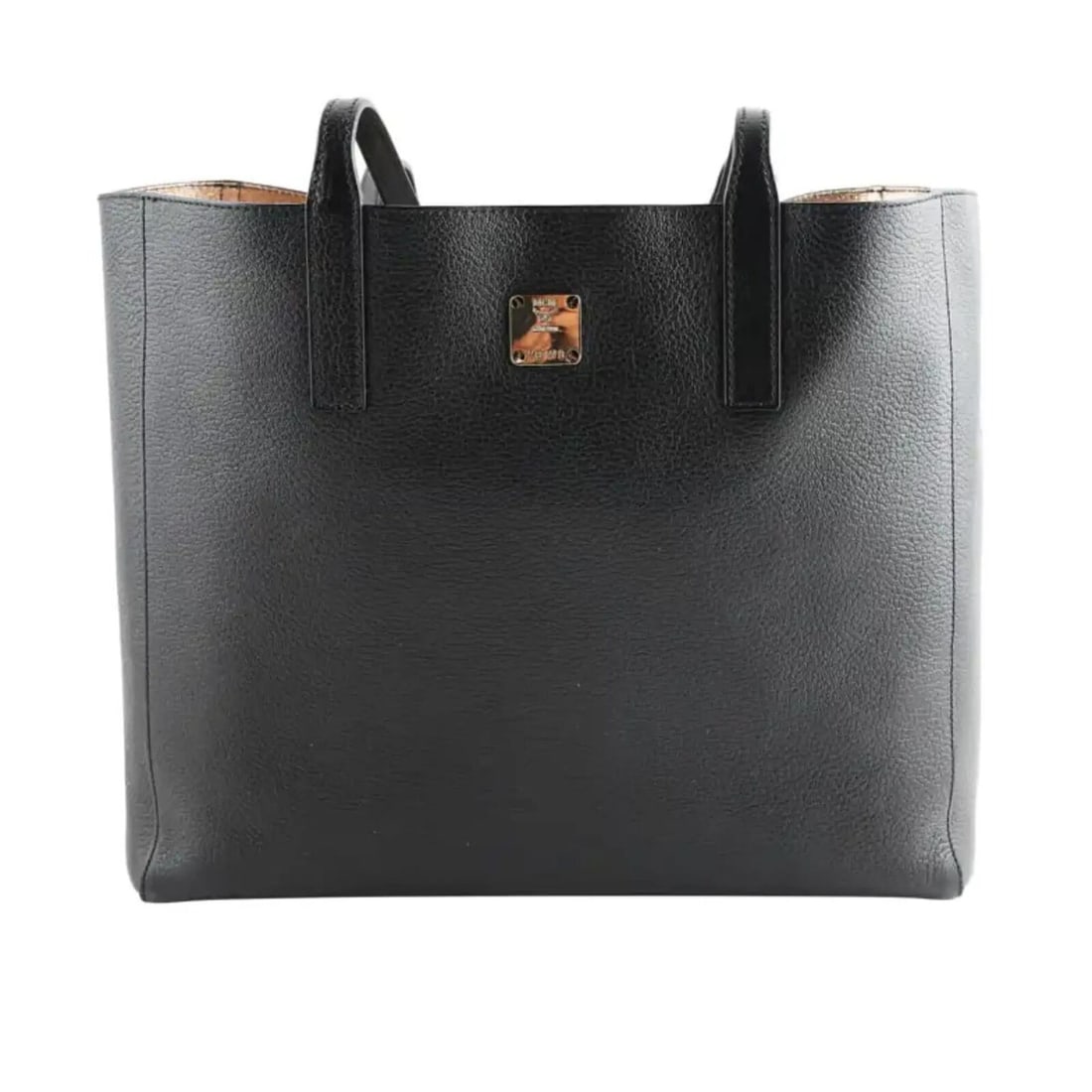 MCM Medium Reversible Black Leather Tote Shopper Bag with Laptop Sleeve: MCM Medium Reversible Black Leather Tote Shopper Bag with Laptop Sleeve This MCM Medium Reversible Tote Shopper Bag is a stylish and versatile accessory, perfect for any season. Crafted from high-qual