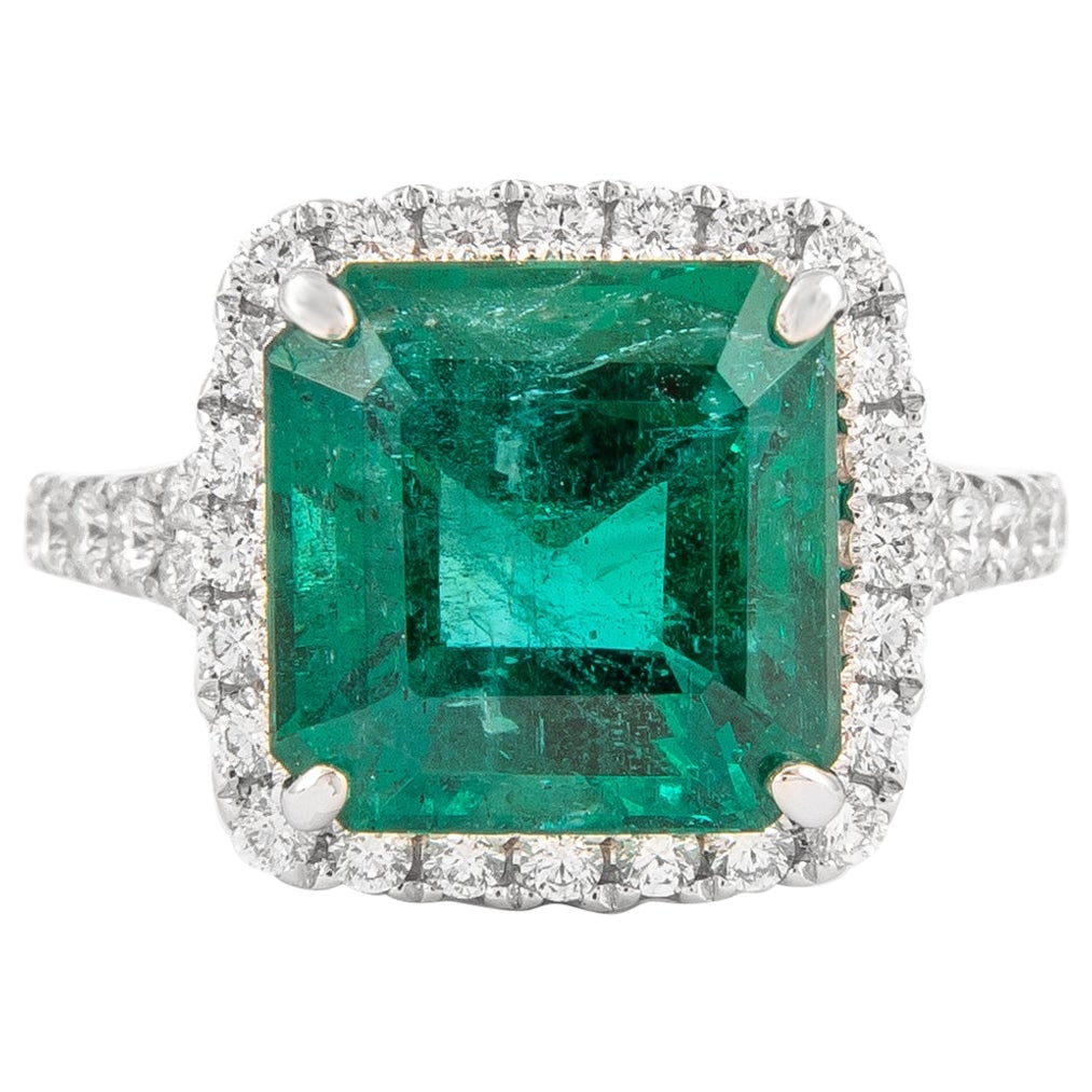 GIA 5.21ct Emerald Cut Emerald with Diamond Halo Ring 18k White Gold: GIA 5.21ct Emerald Cut Emerald with Diamond Halo Ring 18k White Gold This exquisite ring features a stunning 5.21 ct emerald cut emerald, surrounded by a halo of 58 round brilliant diamonds totaling a