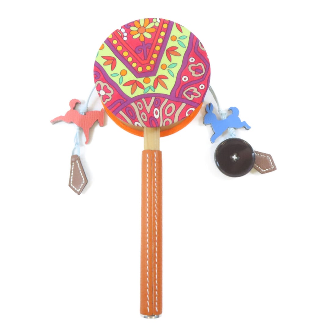 HERMES Tambourine Rattle Drum Leather Multi-Color Toy: HERMES Tambourine Rattle Drum Leather Multi-Color Toy This exquisite HERMES Tambourine Rattle Toy Drum showcases a blend of luxurious materials, combining leather with an elegant design. The vibrant c