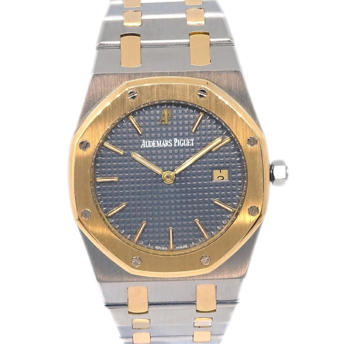 Audemars Piguet Royal Oak Quartz Watch 18K Gold Stainless Steel Vintage: Audemars Piguet Royal Oak Quartz Watch 18K Gold Stainless Steel Vintage This Audemars Piguet Royal Oak Quartz watch features a stunning blend of 18K yellow gold and stainless steel, showcasing its lux