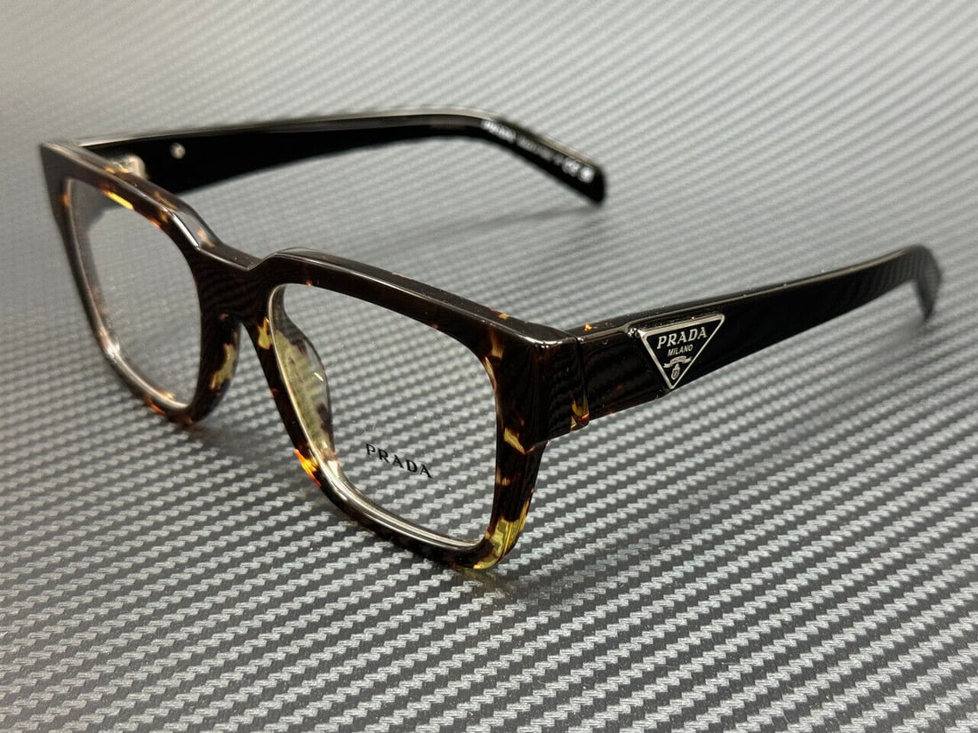 Men's PRADA PR 08ZV 16R1O1 Tortoise Eyeglasses 52 mm: Men's PRADA PR 08ZV 16R1O1 Tortoise Eyeglasses 52 mm Discover the sophistication of PRADA PR 08ZV 16R1O1 eyeglasses, featuring a stylish tortoise frame that adds a touch of elegance to your look. Desi