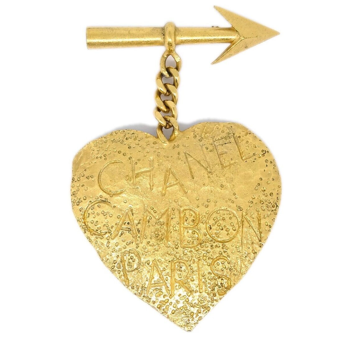 Chanel 93P Gold Bow and Arrow Heart Brooch Pin: Chanel 93P Gold Bow and Arrow Heart Brooch Pin This elegant brooch by Chanel features a distinctive Bow and Arrow Heart design, crafted in a striking gold-plated finish. Measuring 4 inches in length,