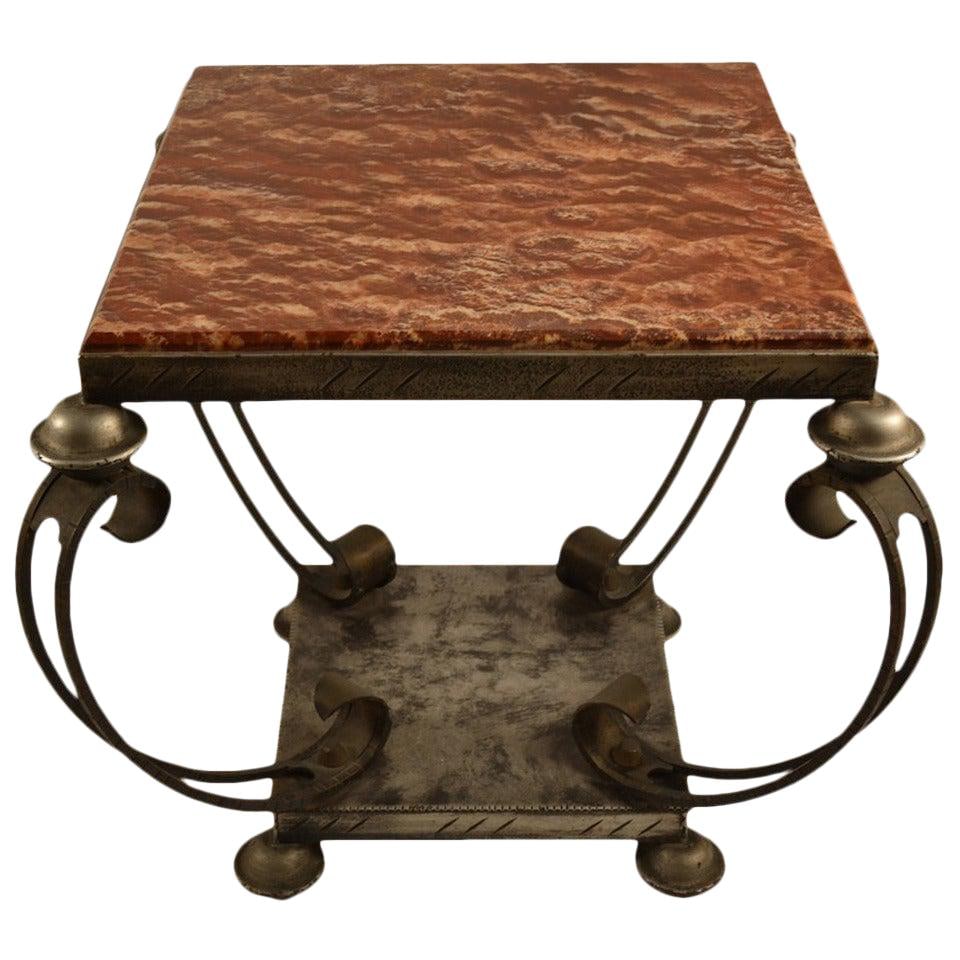 French Art Deco Marble Top Table by John Ford 26 x 26 x 24 in: French Art Deco Marble Top Table by John Ford 26 x 26 x 24 in This French Art Deco table features a thick bevelled marble top and a sturdy steel and iron base, combining both style and durability. Its