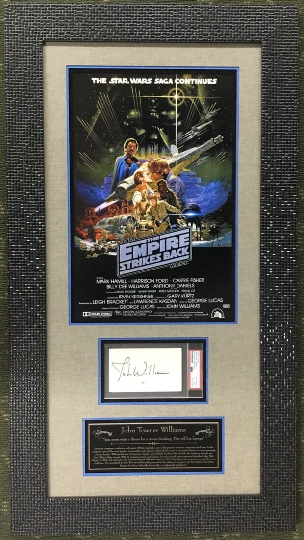 John Williams Signed Star Wars Empire Strikes Back Custom Framed Display PSA/DNA 37 x 20: John Williams Signed Star Wars Empire Strikes Back Custom Framed Display PSA/DNA 37 x 20 This impressive custom framed photo display features a signed cut signature card of John Williams, the iconic c