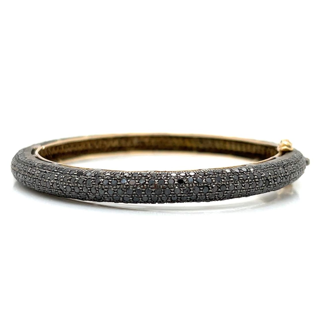 18K Yellow Gold Silver 13 Ct Black Diamond Bangle 7 Inch: 18K Yellow Gold Silver 13 Ct Black Diamond Bangle 7 Inch This exquisite bangle showcases a stunning arrangement of approximately 13.00 ct. of black diamonds, set in a beautiful blend of 18K yellow gol