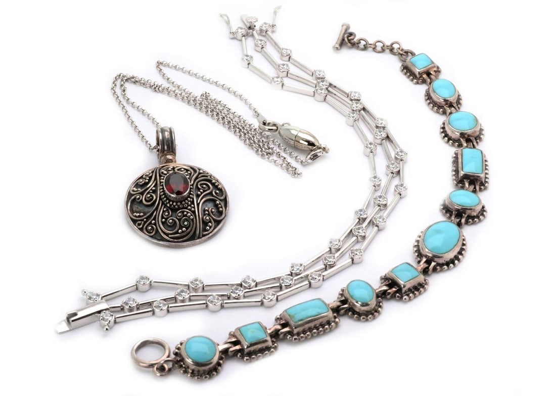 Vintage Lot of 3 Sterling Silver Pendant Chain & Bracelets: Vintage Lot of 3 Sterling Silver Pendant Chain & Bracelets This vintage lot features three exquisite pieces crafted from sterling silver, showcasing a harmonious blend of elegance and style. The set i