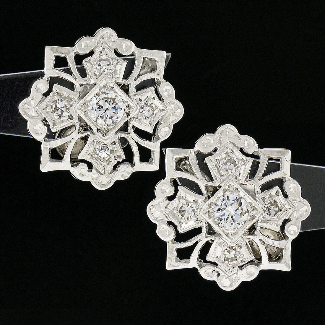 Vintage 14k White Gold Diamond Snowflake Stud Earrings 0.50-0.74ctw Retro: Vintage 14k White Gold Diamond Snowflake Stud Earrings 0.50-0.74ctw Retro Adorn your ears with these exquisite Vintage 14k White Gold Diamond Open Work Snowflake Stud Earrings. Featuring a stunning sn