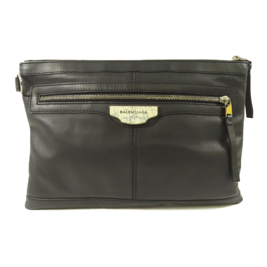 BALENCIAGA Black Calfskin Leather Clutch Bag 273022 SHW: BALENCIAGA Black Calfskin Leather Clutch Bag 273022 SHW This elegant BALENCIAGA clutch bag is crafted from high-quality calfskin leather and features a timeless black exterior. The clutch measures 8.7