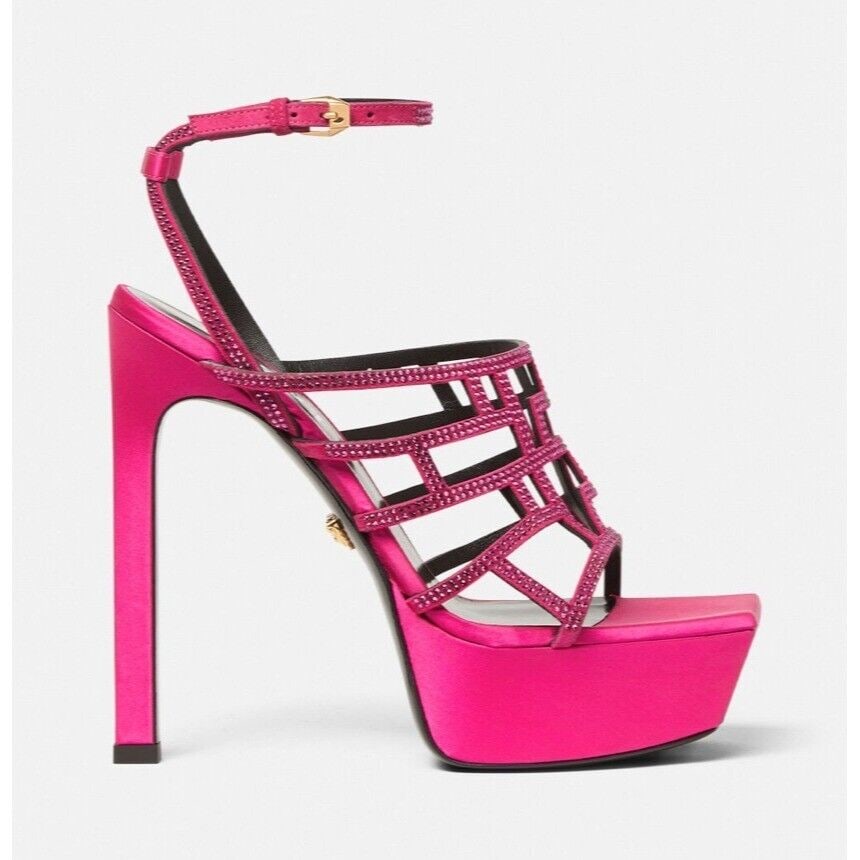 Versace Pink Greca Maze Crystal Stiletto Platform Sandals 39EU: Versace Pink Greca Maze Crystal Stiletto Platform Sandals 39EU Make a statement with these stunning Versace Greca Maze Crystal Open Toe Platform Stiletto Sandal Heels. Crafted from luxurious materials