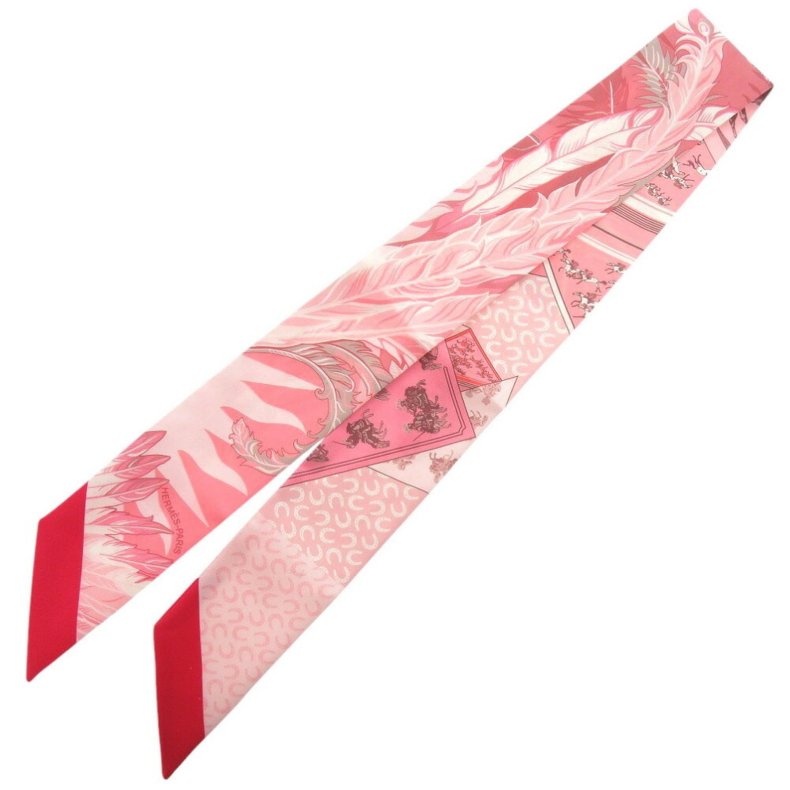 Hermes Twilly Pink Silk Scarf for Women 33.46 inches: Hermes Twilly Pink Silk Scarf for Women 33.46 inches Elevate your accessory collection with this exquisite Hermes Twilly Silk Scarf, designed for women. Featuring a vibrant pink hue, this scarf is cra