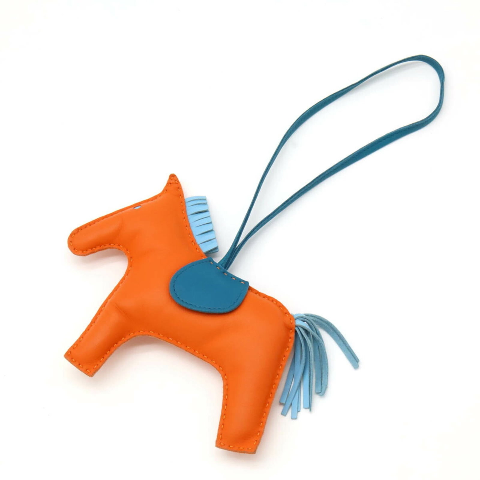 Hermes Rodeo GM Horse Motif Handbag Charm Agneau Milo Blue Orange: Hermes Rodeo GM Horse Motif Handbag Charm Agneau Milo Blue Orange Enhance your handbag with this exquisite Hermes Charm Rodeo GM, featuring a charming horse motif crafted from luxurious Agneau Milo le