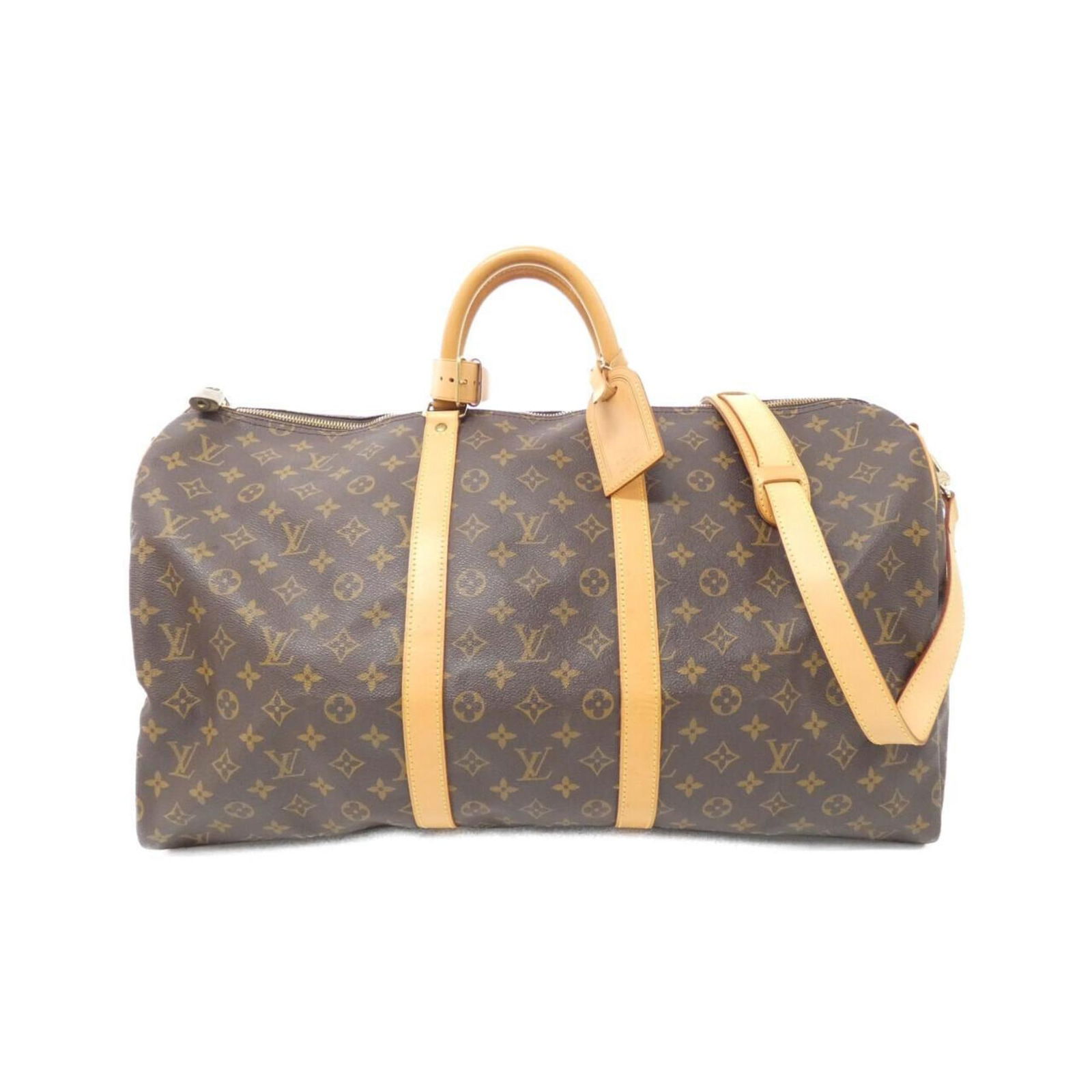 Louis Vuitton Keepall Bandouliere 55 Canvas Travel Bag Brown: Louis Vuitton Keepall Bandouliere 55 Canvas Travel Bag Brown The Louis Vuitton Keepall Bandouliere 55 is a versatile travel bag, expertly crafted from durable canvas in a classic brown color. With dim