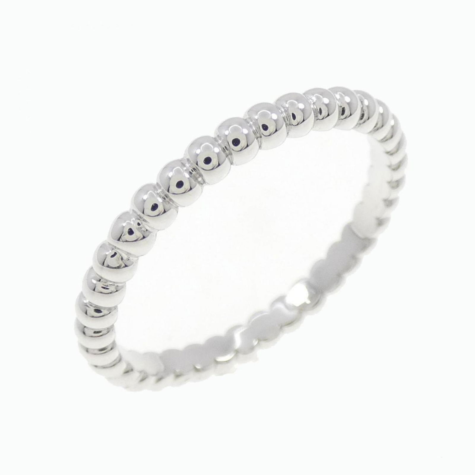 Van Cleef & Arpels 18K White Gold Perlee Band Ring for Women: Van Cleef & Arpels 18K White Gold Perlee Band Ring for Women This exquisite Van Cleef & Arpels Perlee Ring is a stunning band ring crafted from 18K white gold, designed specifically for women. The rin
