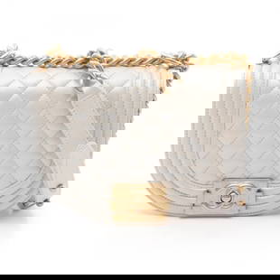 Chanel Boy Leather Shoulder Bag White 5.9 x 7.87 x 2.36 Gold Hardware: Chanel Boy Leather Shoulder Bag White 5.9 x 7.87 x 2.36 Gold Hardware This elegant CHANEL Boy Chanel Shoulder Bag is crafted from premium leather in a stunning white color, making it a perfect accesso