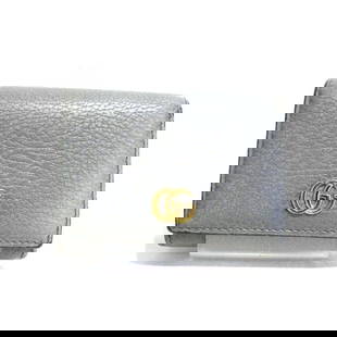 GUCCI GG Marmont Gray Leather Tri-Fold Wallet 10cm x 11cm x 2.5cm: GUCCI GG Marmont Gray Leather Tri-Fold Wallet 10cm x 11cm x 2.5cm The GUCCI GG Marmont Compact Wallet is a stylish tri-fold wallet designed for women. Crafted from high-quality leather in a sophistica