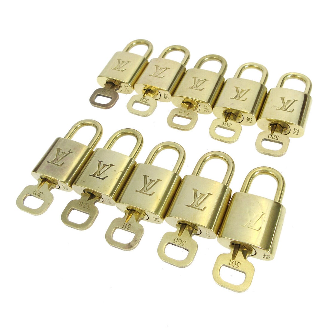 Louis Vuitton Gold Padlock & Key Charm 10 Piece Set: Louis Vuitton Gold Padlock & Key Charm 10 Piece Set Enhance your Louis Vuitton collection with this exquisite Padlock & Key Bag Accessories Charm 10 Piece Set in Gold. This luxurious set is designed t