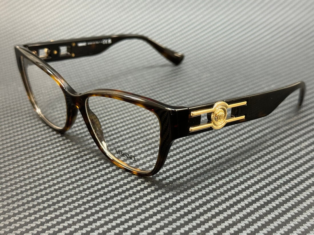 Versace VE3347 108 Brown Havana Women's Eyeglasses 54mm: Versace VE3347 108 Brown Havana Women's Eyeglasses 54mm Elevate your eyewear collection with these VERSACE VE3347 108 Brown Havana Women's Eyeglasses. Crafted by the renowned brand Versace, these eyeg