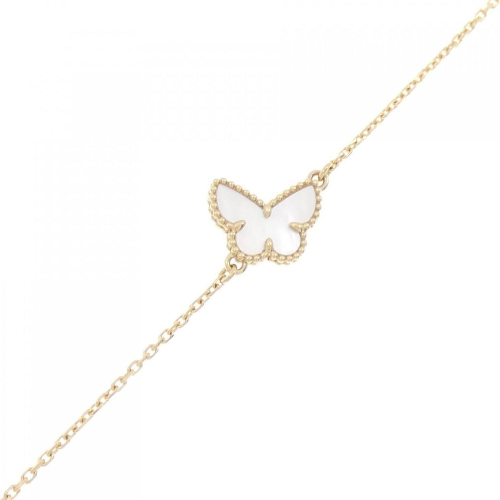 Van Cleef & Arpels Sweet Alhambra 18K Gold Bracelet with Mother of Pearl: Van Cleef & Arpels Sweet Alhambra 18K Gold Bracelet with Mother of Pearl Elevate your accessory collection with the Van Cleef & Arpels Sweet Alhambra Papillon Bracelet. This exquisite charm bracelet i