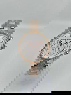 Michael Kors Ritz MK6651 37mm Two-Tone Quartz Crystal Ladies Watch: Michael Kors Ritz MK6651 37mm Two-Tone Quartz Crystal Ladies Watch Introducing the Michael Kors Ritz Pave 37mm Steel Two-Tone Crystal Quartz Ladies Watch (Model: MK6651). This elegant wristwatch featu