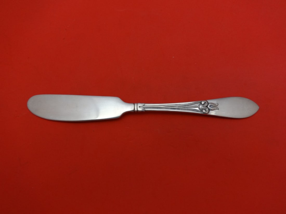 Frank Smith Tulipan Sterling Silver Butter Spreader 6 5/8 Flat Handle: Frank Smith Tulipan Sterling Silver Butter Spreader 6 5/8 Flat Handle This exquisite butter spreader features the elegant Tulipan pattern by Frank Smith, crafted from high-quality sterling silver. It