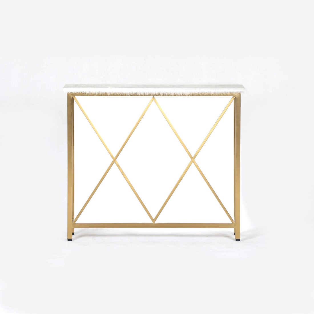 Masquerade White Hair Console Table - Gold Frame: Masquerade White Hair Console Table - Gold Frame Dimensions: 31 H x 37 W x 7.9 D Weight: 16 lbs Materials: hair on hide cow leather table surface, plywood, stainless steel frame Finish: Gold with Ble