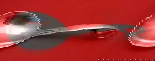 Georg Jensen Ornamental #141 Sterling Silver Berry Spoon 9" with Leaf Handle: Georg Jensen Ornamental #141 Sterling Silver Berry Spoon 9" with Leaf Handle Add elegance to your table setting with this Ornamental #141 Berry Spoon by Georg Jensen. Crafted from high-quality sterlin