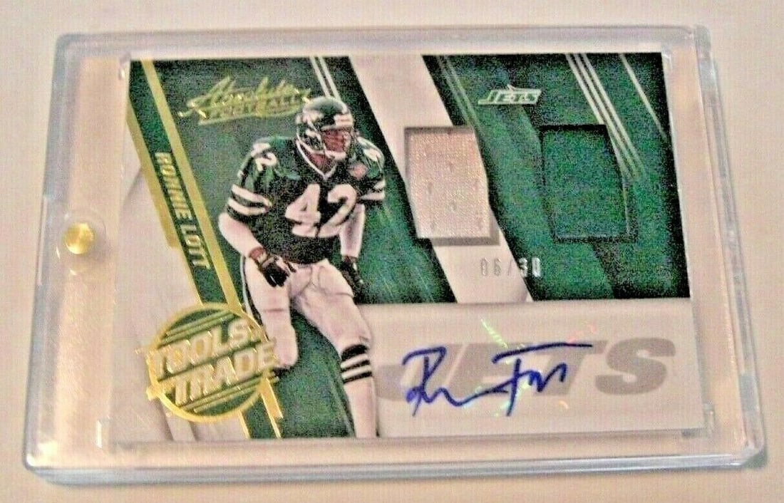 Ronnie Lott 2016 Panini TOTT Dual Jersey Helmet Autograph Card 06/30: Ronnie Lott 2016 Panini TOTT Dual Jersey Helmet Autograph Card 06/30 This is a remarkable 2016 Panini TOTT card featuring a game-used dual jersey and helmet autograph of Ronnie Lott, numbered 06/30. T