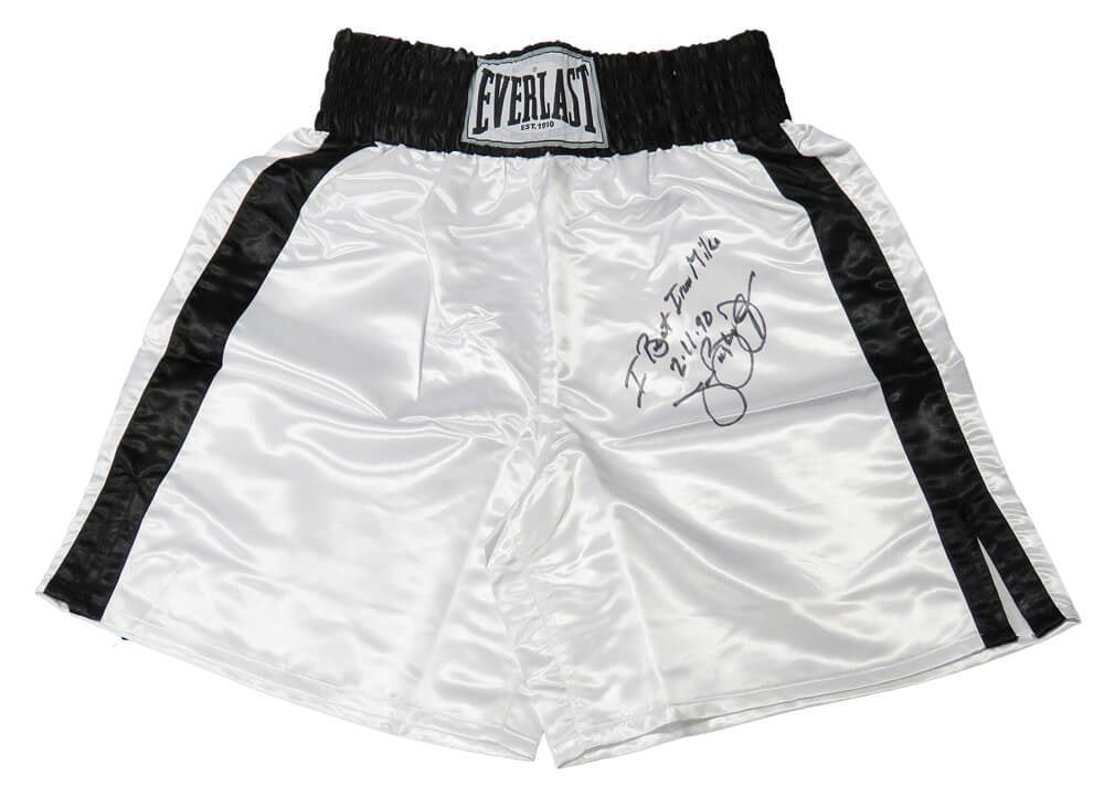 James Buster Douglas Signed Everlast Boxing Trunks I Beat Iron Mike 2-11-90: James Buster Douglas Signed Everlast Boxing Trunks I Beat Iron Mike 2-11-90 Own a piece of boxing history with these James Buster Douglas signed Everlast white boxing trunks, featuring the inscription