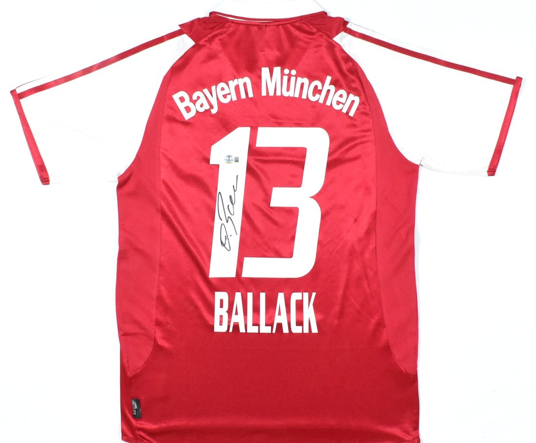 Michael Ballack Signed Bayern Munich Jersey #13 Beckett Authenticated: Michael Ballack Signed Bayern Munich Jersey #13 Beckett Authenticated This is an original Bayern Munich home red soccer jersey, signed by the renowned player Michael Ballack, who wore the number 13. T
