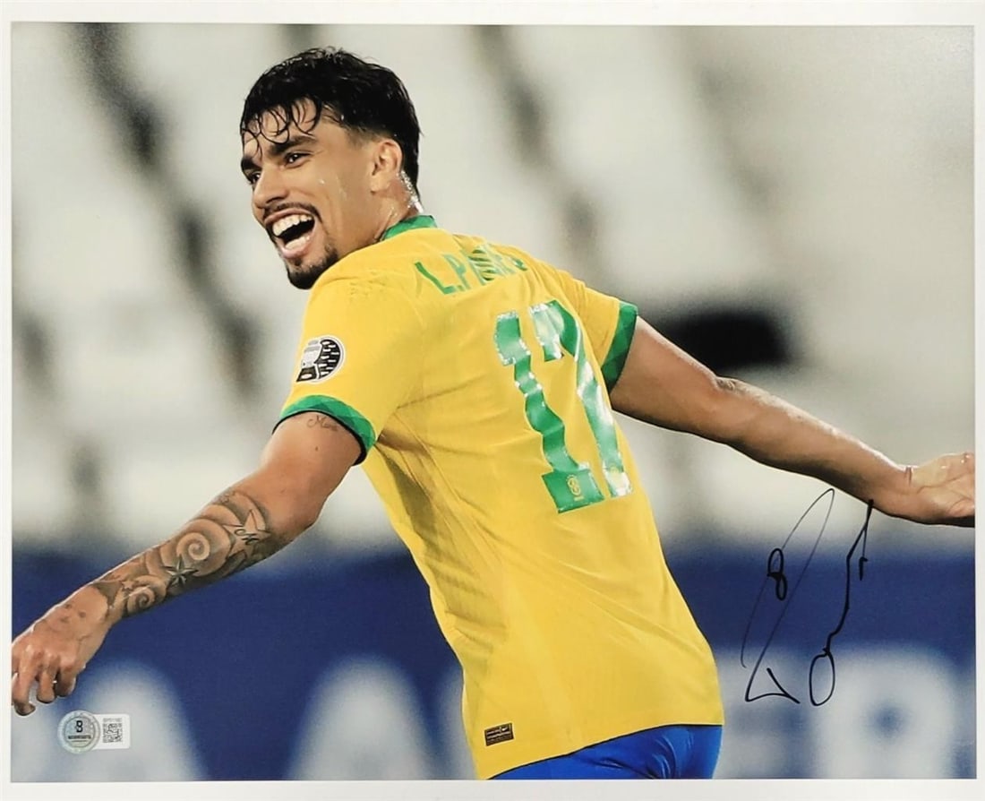 Lucas Paqueta Autographed 11x14 Soccer Photo Brazil Beckett BAS: Lucas Paqueta Autographed 11x14 Soccer Photo Brazil Beckett BAS This is an original 11x14 photograph of Lucas Paqueta, featuring his authentic signature. The item has been authenticated by Beckett Aut