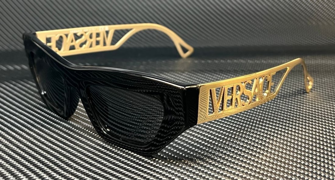 Versace VE4432U GB1 87 Women's Black 53mm Sunglasses: Versace VE4432U GB1 87 Women's Black 53mm Sunglasses Experience elegance with these VERSACE VE4432U GB1 87 sunglasses, designed specifically for women. Featuring a stylish black frame, these sunglasse