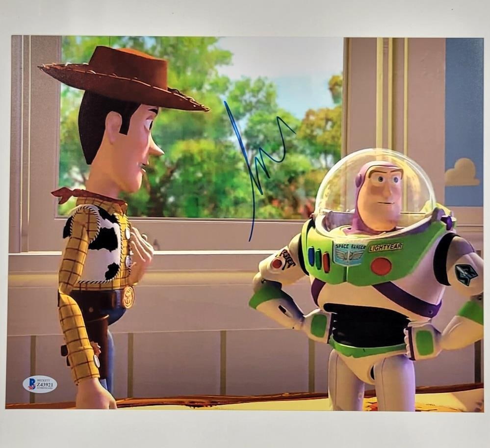 Tim Allen Autographed Toy Story Buzz Lightyear 11x14 Photo Beckett Authenticated: Tim Allen Autographed Toy Story Buzz Lightyear 11x14 Photo Beckett Authenticated This is an original 11x14 photograph featuring Buzz Lightyear from the iconic movie Toy Story, signed by Tim Allen. The