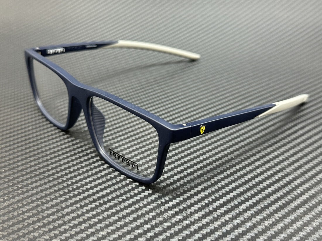 Ferrari FZ8001U 509 Blue Matte Men's Eyeglasses 56mm: Ferrari FZ8001U 509 Blue Matte Men's Eyeglasses 56mm Experience style and sophistication with these Ferrari FZ8001U 509 Blue Matte Men's Eyeglasses. Designed for the modern man, these eyeglasses featu