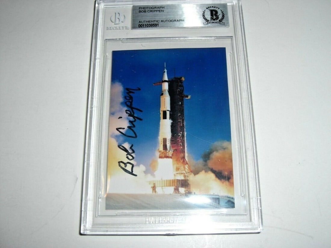 Bob Crippen Signed 2x3 Photo Beckett Certified Space Memorabilia: Bob Crippen Signed 2x3 Photo Beckett Certified Space Memorabilia This is an original 2x3 photo of astronaut Bob Crippen, featuring his signature. The item is encapsulated and authenticated by Beckett,