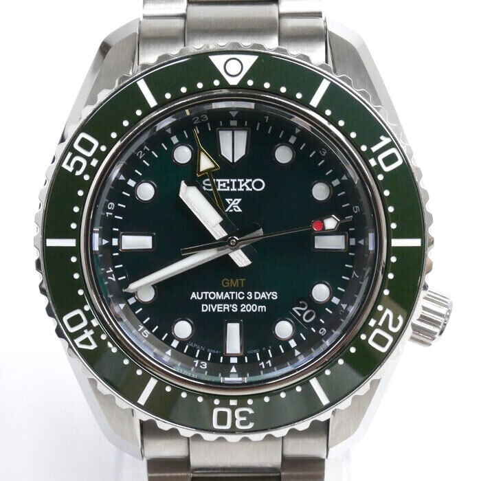 SEIKO Prospex 1968 Mechanical Diver SBEJ009 GMT Men's Watch 42mm Green Dial: SEIKO Prospex 1968 Mechanical Diver SBEJ009 GMT Men's Watch 42mm Green Dial The SEIKO Prospex Mechanical Diver 1968 SBEJ009/6R54-00D0 is a robust and stylish men's wristwatch, designed for diving enth