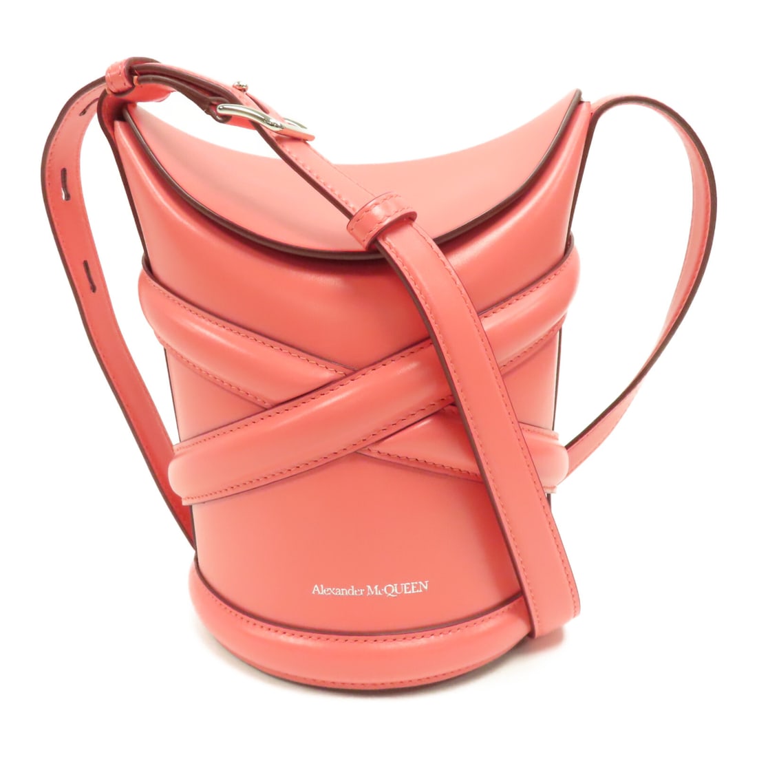 Alexander McQueen Pink Calfskin Leather Bucket Shoulder Bag: Alexander McQueen Pink Calfskin Leather Bucket Shoulder Bag This stylish bucket shoulder bag is crafted from premium calfskin (cowhide) in a vibrant pink hue. Its compact design features a height of 7