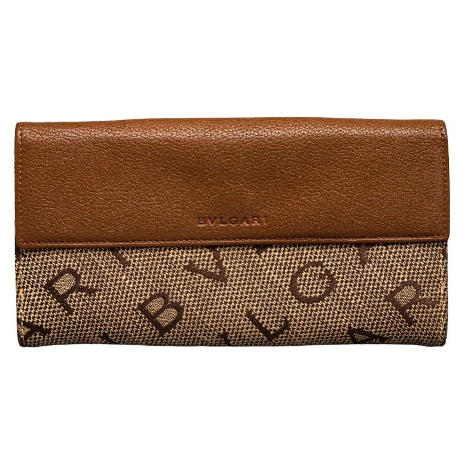 BVLGARI Mania W Tri-Fold Wallet Beige Canvas Leather for Women: BVLGARI Mania W Tri-Fold Wallet Beige Canvas Leather for Women Introducing the BVLGARI Mania W Long Wallet, crafted from high-quality beige canvas leather. This stylish tri-fold wallet is designed spe