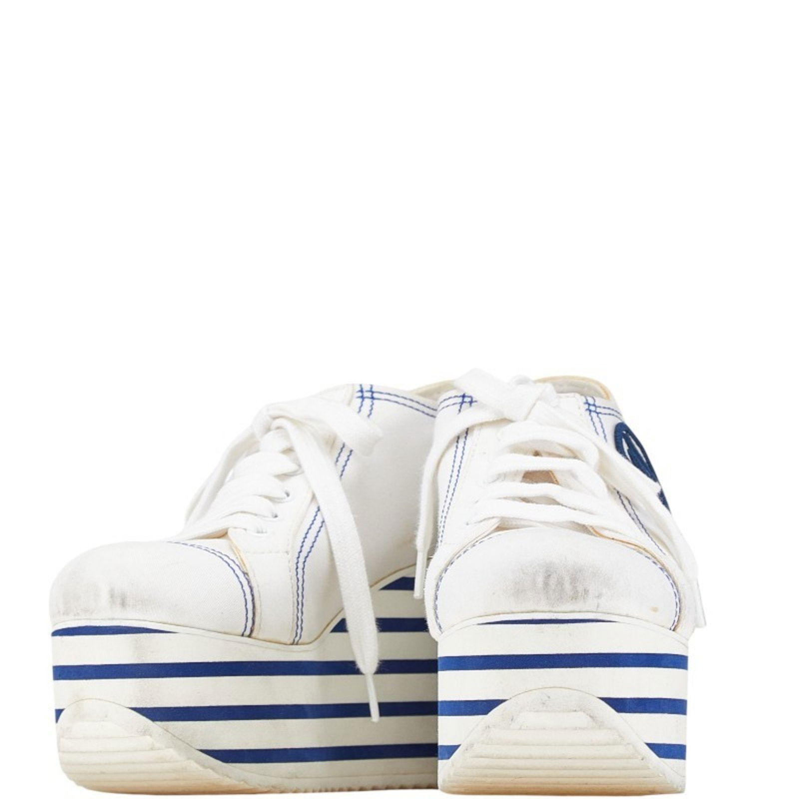 Miu Miu Women's Blue White Canvas Platform Strap Sneakers 37: Miu Miu Women's Blue White Canvas Platform Strap Sneakers 37 Step out in style with these Miu Miu platform strap sneakers, perfect for the fashion-forward woman. Crafted from durable canvas, these sne