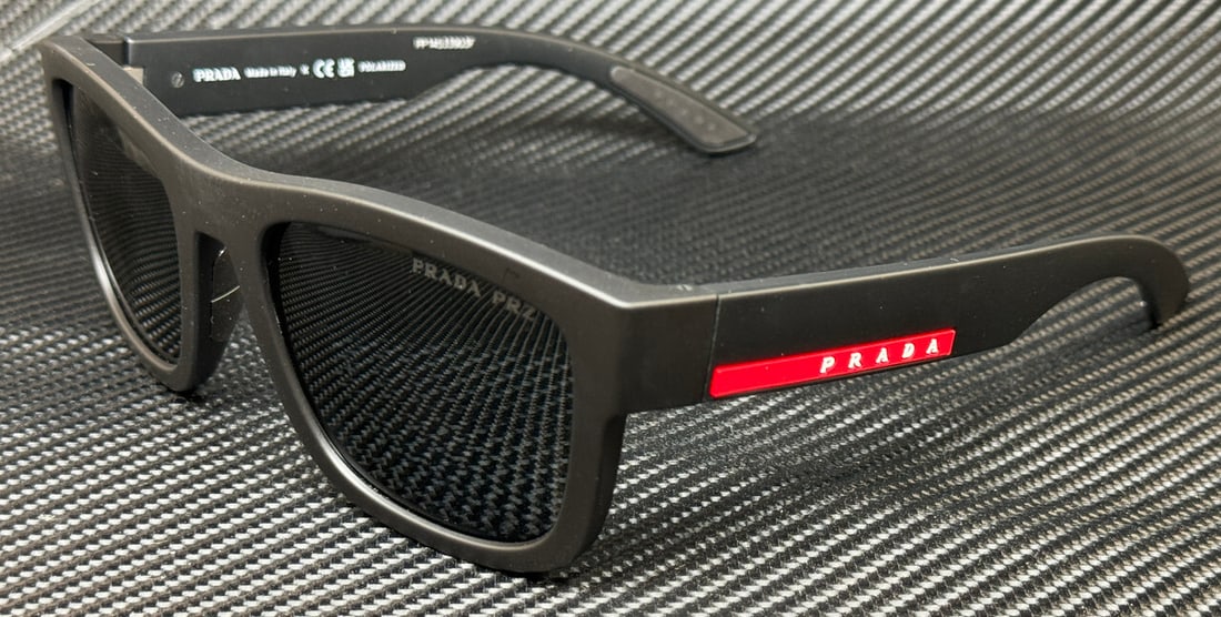 PRADA LINEA ROSSA PS 01ZS DG002G Black Polarized 56mm Sunglasses: PRADA LINEA ROSSA PS 01ZS DG002G Black Polarized 56mm Sunglasses Elevate your eyewear collection with these PRADA LINEA ROSSA PS 01ZS DG002G sunglasses. Featuring a sleek black frame and polarized len