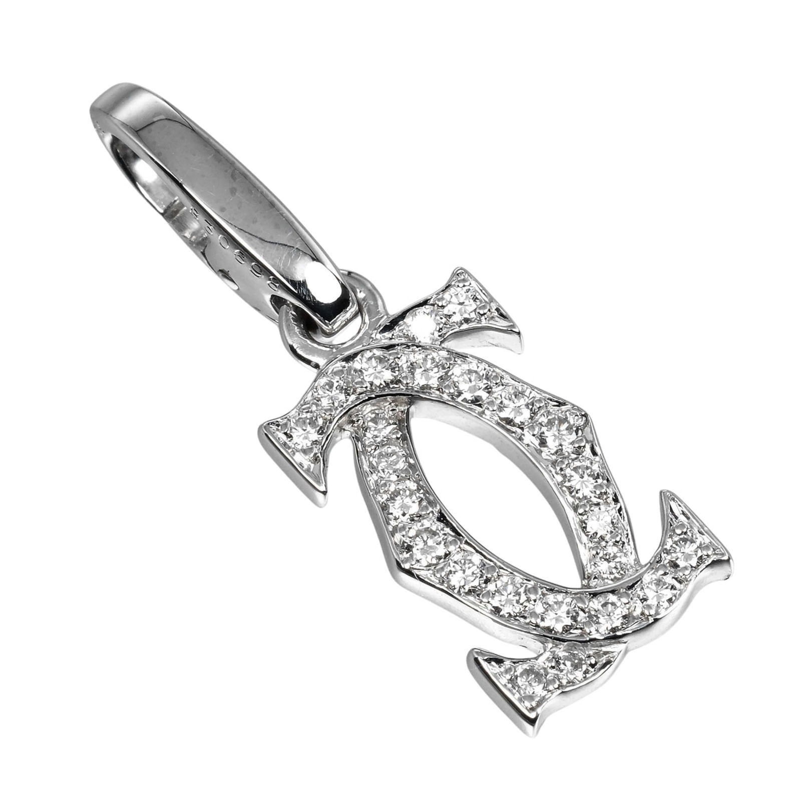 Cartier 2C Charm Pendant in 18K Pink Gold with Diamond: Cartier 2C Charm Pendant in 18K Pink Gold with Diamond This exquisite Cartier 2C Charm Pendant is crafted from luxurious 18K pink gold, exuding elegance and charm. Designed for women, this pendant fea