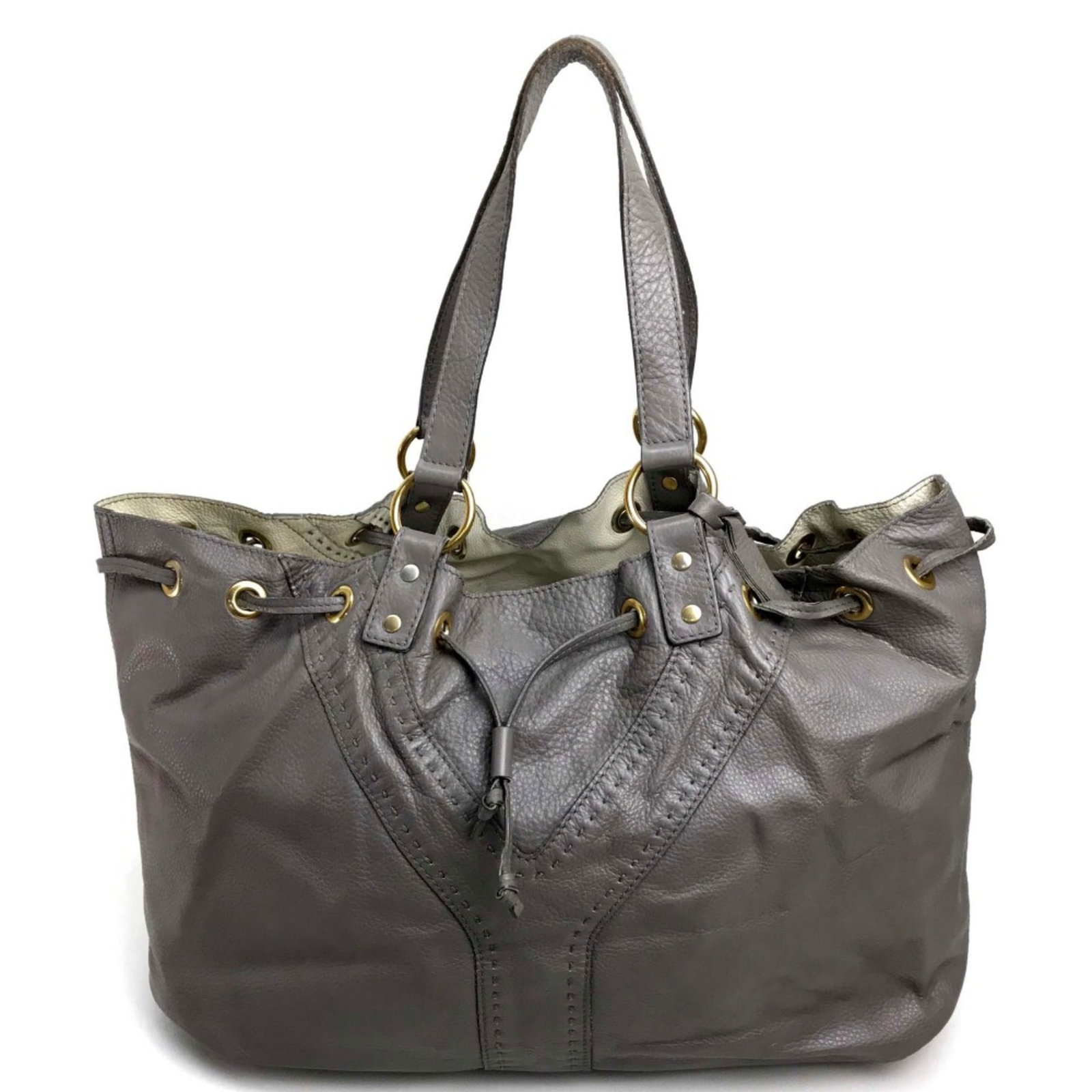 Yves Saint Laurent Reversible Tote Bag Charcoal Gray White Leather: Yves Saint Laurent Reversible Tote Bag Charcoal Gray White Leather This Yves Saint Laurent reversible tote bag is a stylish and versatile accessory designed for women. Crafted from high-quality leathe