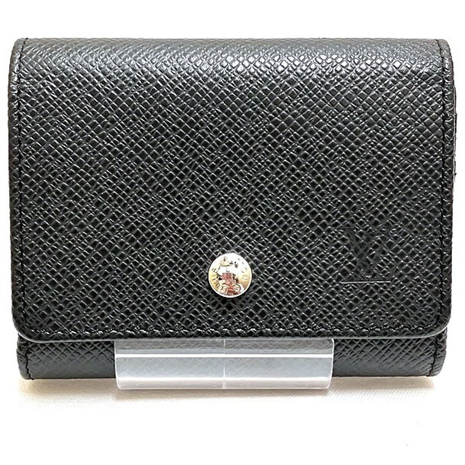 Louis Vuitton Taiga Porto Monnaie Sergei Coin Purse Ardoise Leather T.H. Inscription: Louis Vuitton Taiga Porto Monnaie Sergei Coin Purse Ardoise Leather T.H. Inscription Discover the Louis Vuitton Taiga Porto Monnaie Sergei Wallet, a chic and functional coin purse designed for both me