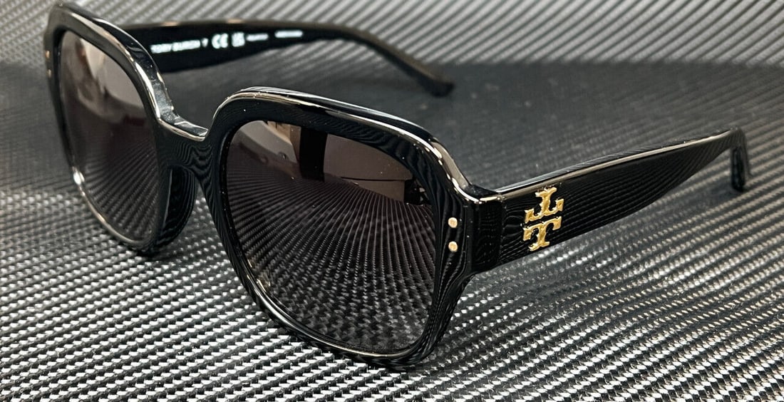 Tory Burch TY7143U Black Acetate Square Sunglasses with Gradient Polarized Gray Lenses: Tory Burch TY7143U Black Acetate Square Sunglasses with Gradient Polarized Gray Lenses Discover elegance and sophistication with the Tory Burch TY7143U sunglasses. These stylish square sunglasses feat