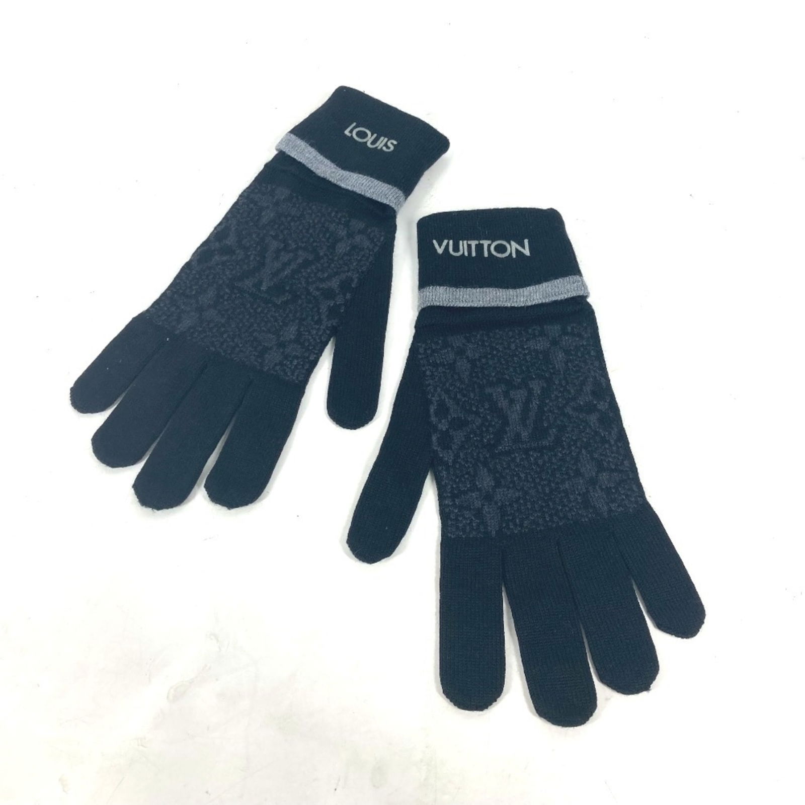 Louis Vuitton M73470 Men's Wool Gloves Monogram Eclipse Black Gray: Louis Vuitton M73470 Men's Wool Gloves Monogram Eclipse Black Gray Elevate your winter wardrobe with these luxurious Louis Vuitton men's gloves, expertly crafted from high-quality wool. The sleek blac